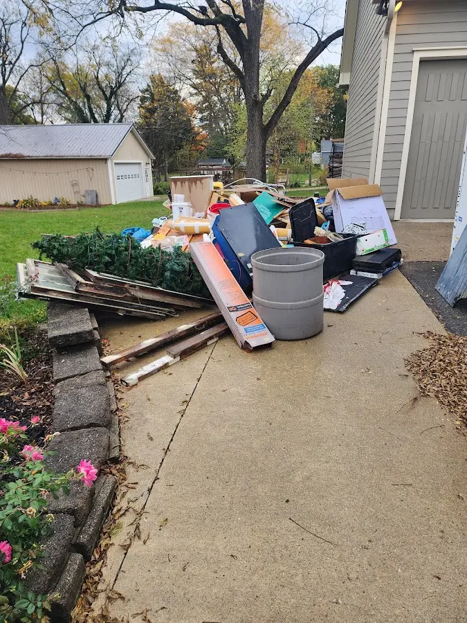 Dumpster being loaded with debris for Demolition Dumpster Rental in Whitemarsh
